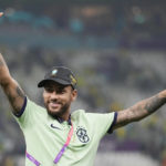 
              Brazil's Neymar greets the supporters after the World Cup group G soccer match between Cameroon and Brazil, at the Lusail Stadium in Lusail, Qatar, Saturday, Dec. 3, 2022. (AP Photo/Moises Castillo)
            