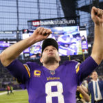 Minnesota Vikings quarterback Kirk Cousins celebrates after an NFL football game against the Indianapolis Colts, Saturday, Dec. 17, 2022, in Minneapolis. The Vikings won 39-36 in overtime. (AP Photo/Abbie Parr)