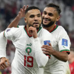 
              Morocco's Youssef En-Nesyri , left, celebrates beside Morocco's Sofiane Boufal, right, after he scored his side's second goal during the World Cup group F soccer match between Canada and Morocco at the Al Thumama Stadium in Doha , Qatar, Thursday, Dec. 1, 2022. (AP Photo/Natacha Pisarenko)
            