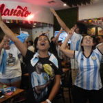 
              Fans celebrate at a watch party as Argentina scores a goal against Croatia Tuesday, Dec. 13, 2022, in Miami Beach, Fla. Argentina defeated Croatia 3-0 to advance to the final game. (AP Photo/Marta Lavandier, Pool)
            