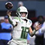 Oregon quarterback Bo Nix throws a pass during the second half of the team's Holiday Bowl NCAA college football game against North Carolina on Wednesday, Dec. 28, 2022, in San Diego. (AP Photo/Denis Poroy)