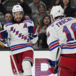 
              New York Rangers center Mika Zibanejad (93) celebrates after scoring against the Vegas Golden Knights during the third period of an NHL hockey game Wednesday, Dec. 7, 2022, in Las Vegas. (AP Photo/John Locher)
            