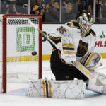 Boston Bruins goaltender Linus Ullmark makes a save against the Colorado Avalanche during the first period of an NHL hockey game Saturday, Dec. 3, 2022, in Boston. (AP Photo/Winslow Townson)