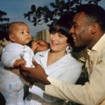 
              FILE - Brazilian soccer star Pele and his wife Rosemeri pose for a photo with their daughter Kelly, in an unknown location, June 1967. Pelé, the Brazilian king of soccer who won a record three World Cups and became one of the most commanding sports figures of the last century, died in Sao Paulo on Thursday, Dec. 29, 2022. He was 82.  (AP Photo, File)
            