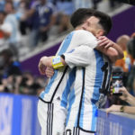 Argentina's Julian Alvarez, left, and Lionel Messi celebrate third goal during the World Cup semifinal soccer match between Argentina and Croatia at the Lusail Stadium in Lusail, Qatar, Tuesday, Dec. 13, 2022. (AP Photo/Manu Fernandez)
