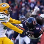 
              Chicago Bears' N'Keal Harry catches a pass in front of Green Bay Packers' Jaire Alexander during the second half of an NFL football game Sunday, Dec. 4, 2022, in Chicago. (AP Photo/Nam Y. Huh)
            