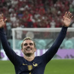 France's Antoine Griezmann celebrates after the World Cup semifinal soccer match between France and Morocco at the Al Bayt Stadium in Al Khor, Qatar, Wednesday, Dec. 14, 2022. (AP Photo/Francisco Seco)