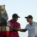 
              Norway,'s Viktor Hovland, right, talks to Tiger Woods, after winning the Hero World Challenge PGA Tour at the Albany Golf Club in New Providence, Bahamas, Sunday, Dec. 4, 2022. (AP Photo/Fernando Llano)
            