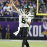 
              New York Jets quarterback Mike White throws a pass during the second half of an NFL football game against the Minnesota Vikings, Sunday, Dec. 4, 2022, in Minneapolis. The Vikings won 27-22. (AP Photo/Bruce Kluckhohn)
            