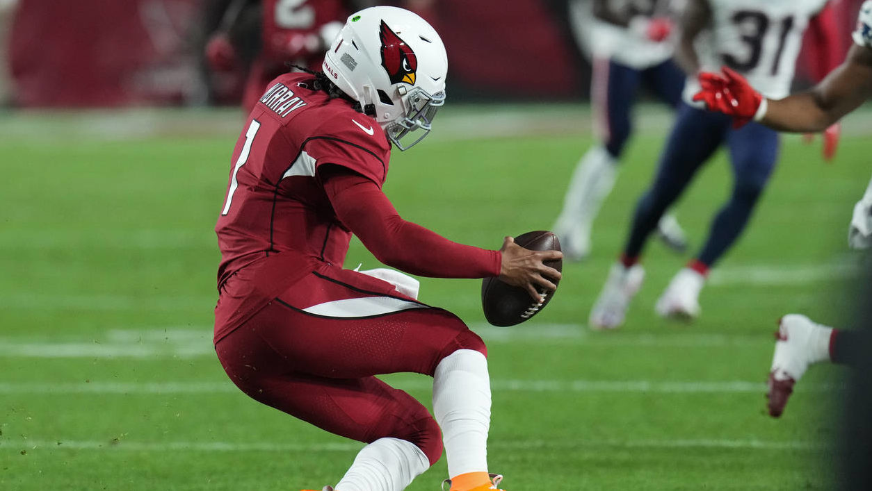 Arizona Cardinals quarterback Kyler Murray (1) falls to the ground due to an injury during the firs...