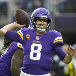 Minnesota Vikings quarterback Kirk Cousins (8) throws a pass during the first half of an NFL football game against the Indianapolis Colts, Saturday, Dec. 17, 2022, in Minneapolis. (AP Photo/Abbie Parr)