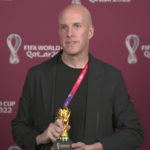 A screenshot taken from video provided by FIFA of journalist Grant Wahl at an awards ceremony in Doha, Qatar in Nov. 2022. Wahl, one of the most well-known soccer writers in the United States, died early Saturday Dec. 10, 2022 while covering the World Cup match between Argentina and the Netherlands. (FIFA via AP)