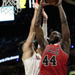 Chicago Bulls forward Patrick Williams (44) goes to the basket as Miami Heat guard Max Strus, left, defends during the first half of an NBA basketball game, Tuesday, Dec. 20, 2022, in Miami. (AP Photo/Lynne Sladky)
