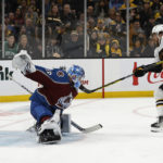 
              Boston Bruins' David Pastrnak scores on Colorado Avalanche goaltender Pavel Francouz during the second period of an NHL hockey game Saturday, Dec. 3, 2022, in Boston. (AP Photo/Winslow Townson)
            