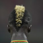 Mali's Falaye Sacko stands on the pitch during the African Cup of Nations 2022 group F soccer match between Mali and Mauritania at the Japoma Stadium in Douala, Cameroon, Thursday, Jan. 20, 2022. (AP Photo/Themba Hadebe)