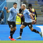 
              Uruguay's Giorgian de Arrascaeta, right, celebrates with Uruguay's Luis Suarez, after scoring the opening goal during the World Cup group H soccer match between Ghana and Uruguay, at the Al Janoub Stadium in Al Wakrah, Qatar, Friday, Dec. 2, 2022. (AP Photo/Manu Fernandez)
            