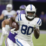 Indianapolis Colts tight end Jelani Woods (80) runs up field after catching a pass during the first half of an NFL football game against the Minnesota Vikings, Saturday, Dec. 17, 2022, in Minneapolis. (AP Photo/Andy Clayton-King)