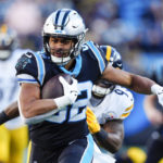 
              Carolina Panthers tight end Tommy Tremble runs during the second half of an NFL football game between the Carolina Panthers and the Pittsburgh Steelers on Sunday, Dec. 18, 2022, in Charlotte, N.C. (AP Photo/Jacob Kupferman)
            