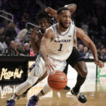 Kansas State guard Markquis Nowell (1) drives during the first half of an NCAA college basketball game against Abilene Christian Tuesday, Dec. 6, 2022, in Manhattan, Kan. (AP Photo/Charlie Riedel)