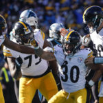 
              Pittsburgh Steelers running back Jaylen Warren during the first half of an NFL football game between the Carolina Panthers and the Pittsburgh Steelers on Sunday, Dec. 18, 2022, in Charlotte, N.C. (AP Photo/Rusty Jones)
            