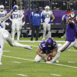 Minnesota Vikings place kicker Greg Joseph, right, kicks a 40-yard field goal during overtime in an NFL football game against the Indianapolis Colts, Saturday, Dec. 17, 2022, in Minneapolis. The Vikings won 39-36. (AP Photo/Andy Clayton-King)