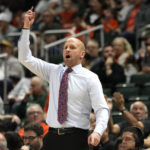
              St. Francis head coach Rob Krimmel directs his team during the second half of an NCAA college basketball game against Miami, Saturday, Dec. 17, 2022, in Coral Gables, Fla. Miami won 91-76. (AP Photo/Lynne Sladky)
            