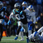 
              Carolina Panthers running back D'Onta Foreman runs during the first half of an NFL football game between the Carolina Panthers and the Detroit Lions on Saturday, Dec. 24, 2022, in Charlotte, N.C. (AP Photo/Rusty Jones)
            
