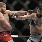 Jan Blachowicz, left, fights Magomed Ankalaev during a UFC 282 mixed martial arts light heavyweight title bout Saturday, Dec. 10, 2022, in Las Vegas. (AP Photo/John Locher)
