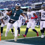 
              Philadelphia Eagles' Jalen Hurts scores a touchdown during the first half of an NFL football game against the Tennessee Titans, Sunday, Dec. 4, 2022, in Philadelphia. (AP Photo/Matt Rourke)
            