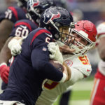 
              Houston Texans quarterback Jeff Driskel (6) is hit by Kansas City Chiefs defensive end George Karlaftis (56) during the first half of an NFL football game Sunday, Dec. 18, 2022, in Houston. (AP Photo/David J. Phillip)
            