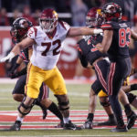 
              FILE - Southern California offensive lineman Andrew Vorhees (72) defends during the first half of an NCAA college football game against Utah on Saturday, Oct. 15, 2022, in Salt Lake City. Southern California players Vorhees, quarterback Caleb Williams and defensive end Tuli Tuipulotu were selected to The Associated Press All-America team released Monday, Dec. 12, 2022. (AP Photo/Rick Bowmer, File)
            