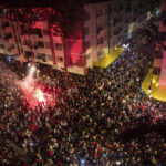 
              Thousands of Moroccans gather to celebrate Morocco's win over Spain in a World Cup match played in Qatar, in Rabat, Morocco, Tuesday, Dec. 6, 2022. (AP Photo/Mosa'ab Elshamy)
            