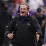 
              FILE - TCU head coach Sonny Dykes cheers after his team scored during the first half of an NCAA college football game against Iowa State in Fort Worth, Texas, Saturday, Nov. 26, 2022. TCU's Sonny Dykes won The Associated Press Coach of the Year on Monday, Dec. 19, after leading the No. 3 Horned Frogs to the College Football Playoff in his first season with the school.(AP Photo/LM Otero, File)
            