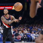 Portland Trail Blazers guard Damian Lillard passes the ball in the first half of an NBA basketball game against the Oklahoma City Thunder, Wednesday, Dec. 21, 2022, in Oklahoma City. (AP Photo/Nate Billings)
