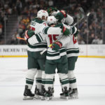 
              Minnesota Wild players celebrate after center Connor Dewar (26) scored during the second period of an NHL hockey game against the Anaheim Ducks in Anaheim, Calif., Wednesday, Dec. 21, 2022. (AP Photo/Ashley Landis)
            