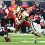 
              Kansas City Chiefs running back Isiah Pacheco (10) runs past Houston Texans cornerback Desmond King II (25) during the first half of an NFL football game Sunday, Dec. 18, 2022, in Houston. (AP Photo/Eric Christian Smith)
            