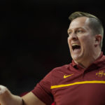 
              Iowa State head coach T.J. Otzelberger directs his players during the first half of an NCAA college basketball game against St. John's, Sunday, Dec. 4, 2022, in Ames, Iowa. (AP Photo/ Matthew Putney)
            