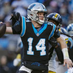 Carolina Panthers quarterback Sam Darnold looks to pass under pressure from Pittsburgh Steelers safety Terrell Edmunds during the second half of an NFL football game between the Carolina Panthers and the Pittsburgh Steelers on Sunday, Dec. 18, 2022, in Charlotte, N.C. (AP Photo/Rusty Jones)