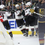 The Arizona Coyotes celebrate a goal against the Vegas Golden Knights during the third period of an NHL hockey game Wednesday, Dec. 21, 2022, in Las Vegas. (AP Photo/Chase Stevens)