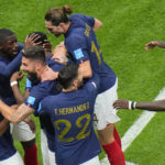 France players celebrate after France's Aurelien Tchouameni scored his side's opening goal during the World Cup quarterfinal soccer match between England and France, at the Al Bayt Stadium in Al Khor, Qatar, Saturday, Dec. 10, 2022. (AP Photo/Hassan Ammar)