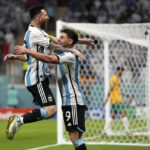 
              Argentina's Julian Alvarez, right, and Lionel Messi, left, celebrate their side's second goal during the World Cup round of 16 soccer match between Argentina and Australia at the Ahmad Bin Ali Stadium in Doha, Qatar, Saturday, Dec. 3, 2022. (AP Photo/Frank Augstein)
            