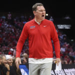 Arizona head coach Tommy Lloyd directs his team during the first half of an NCAA college basketball game against Indiana, Saturday, Dec. 10, 2022, in Las Vegas. (AP Photo/Chase Stevens)
