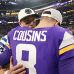 Indianapolis Colts quarterback Matt Ryan talks with Minnesota Vikings quarterback Kirk Cousins (8) after an NFL football game, Saturday, Dec. 17, 2022, in Minneapolis. The Vikings won 39-36 in overtime. (AP Photo/Abbie Parr)