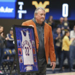
              West Virginia coach Bob Huggins is honored during the first half of an NCAA college basketball game against Buffalo in Morgantown, W.Va., Sunday, Dec. 18, 2022. (AP Photo/Kathleen Batten)
            