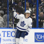 Toronto Maple Leafs right wing William Nylander (88) celebrates his goal against the Tampa Bay Lightning during the second period of an NHL hockey game Saturday, Dec. 3, 2022, in Tampa, Fla. (AP Photo/Chris O'Meara)