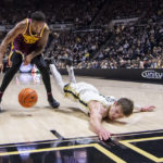 
              Purdue guard Braden Smith, right, slides out-of-bounds while attempting to steal the ball away from Minnesota guard Ta'lon Cooper during the second half of an NCAA college basketball game, Sunday, Dec. 4, 2022, in West Lafayette, Ind. (AP Photo/Doug McSchooler)
            