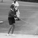 
              CORRECTS DATE TO SATURDAY, DEC. 24, 2022, NOT SATURDAY, DEC. 25, 2022. - FILE - Kathy Whitworth of San Antonio,  blast out of sand trap on 18th green and then sinks a 6-foot putt to go into the lead of the Women Titleholders Golf Tournament at Augusta, Ga., Nov. 25, 1966. Former LPGA Tour player Whitworth, whose 88 victories are the most by any golfer on a single professional tour, died on Saturday, Dec. 25, 2022, night, her longtime partner said. She was 83. (AP Photo/Horace Cort, File)
            