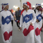 France's soccer fans arrive for the World Cup round of 16 soccer match between France and Poland, at the Al Thumama Stadium in Doha, Qatar, Sunday, Dec. 4, 2022. (AP Photo/Christophe Ena)