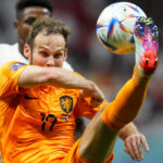 
              Daley Blind of the Netherlands connects a shot during a World Cup group A soccer match against Qatar at the Al Bayt Stadium in Al Khor, Qatar, Tuesday, Nov. 29, 2022. (AP Photo/Petr David Josek)
            