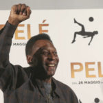 
              FILE - Brazilian soccer legend Edson Arantes Do Nascimiento better known as 'Pele', gestures during a photocall of the movie 'Pele', in Milan, Italy, Wednesday, May 25, 2016. Pelé, the Brazilian king of soccer who won a record three World Cups and became one of the most commanding sports figures of the last century, died in Sao Paulo on Thursday, Dec. 29, 2022. He was 82. (AP Photo/Luca Bruno, File)
            
